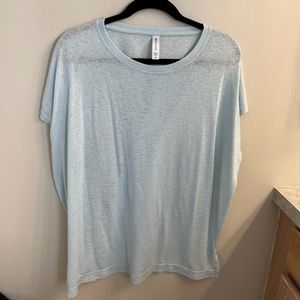 Athleta, light blue oversized tee shirt. Size M
